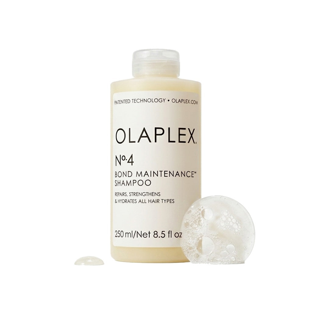 Olaplex No.4 Bond Maintenance Shampoo bottle with a white background