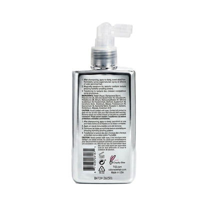 Back view of a bottle with text and a pump on a white background